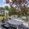 pool courtyard with table and grill