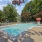 Resort style pool with grill and lounge