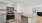 kitchen with long eat at island